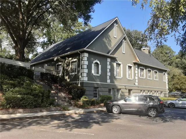 a car parked in front of a house