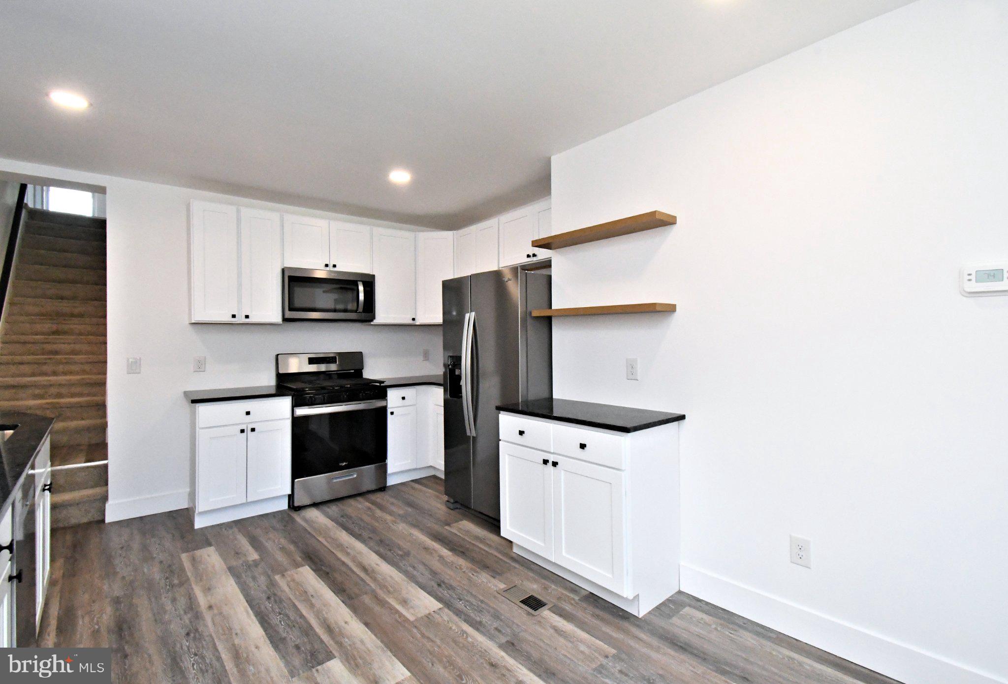 64 North Main Street Spring City, PA 19475 - Photo 10 of 26 Modern kitchen with sleek finishes.