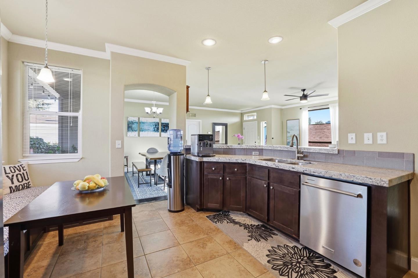 125 North Mary Avenue, Unit 17 Sunnyvale, CA 94086 - Photo 12 of 46 a large kitchen with lots of counter space and breakfast area