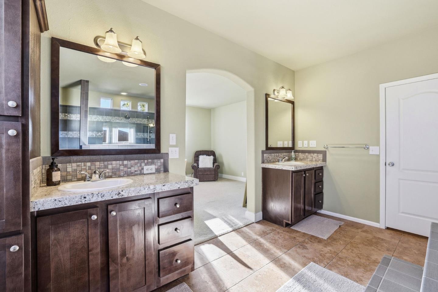 125 North Mary Avenue, Unit 17 Sunnyvale, CA 94086 - Photo 30 of 46 a bathroom with a sink and a mirror