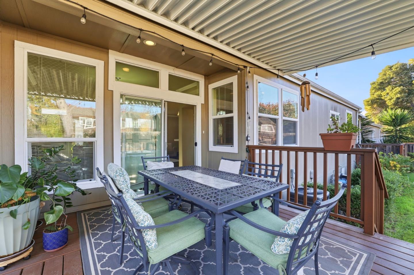 125 North Mary Avenue, Unit 17 Sunnyvale, CA 94086 - Photo 34 of 46 a view of a patio with table and chairs and potted plants