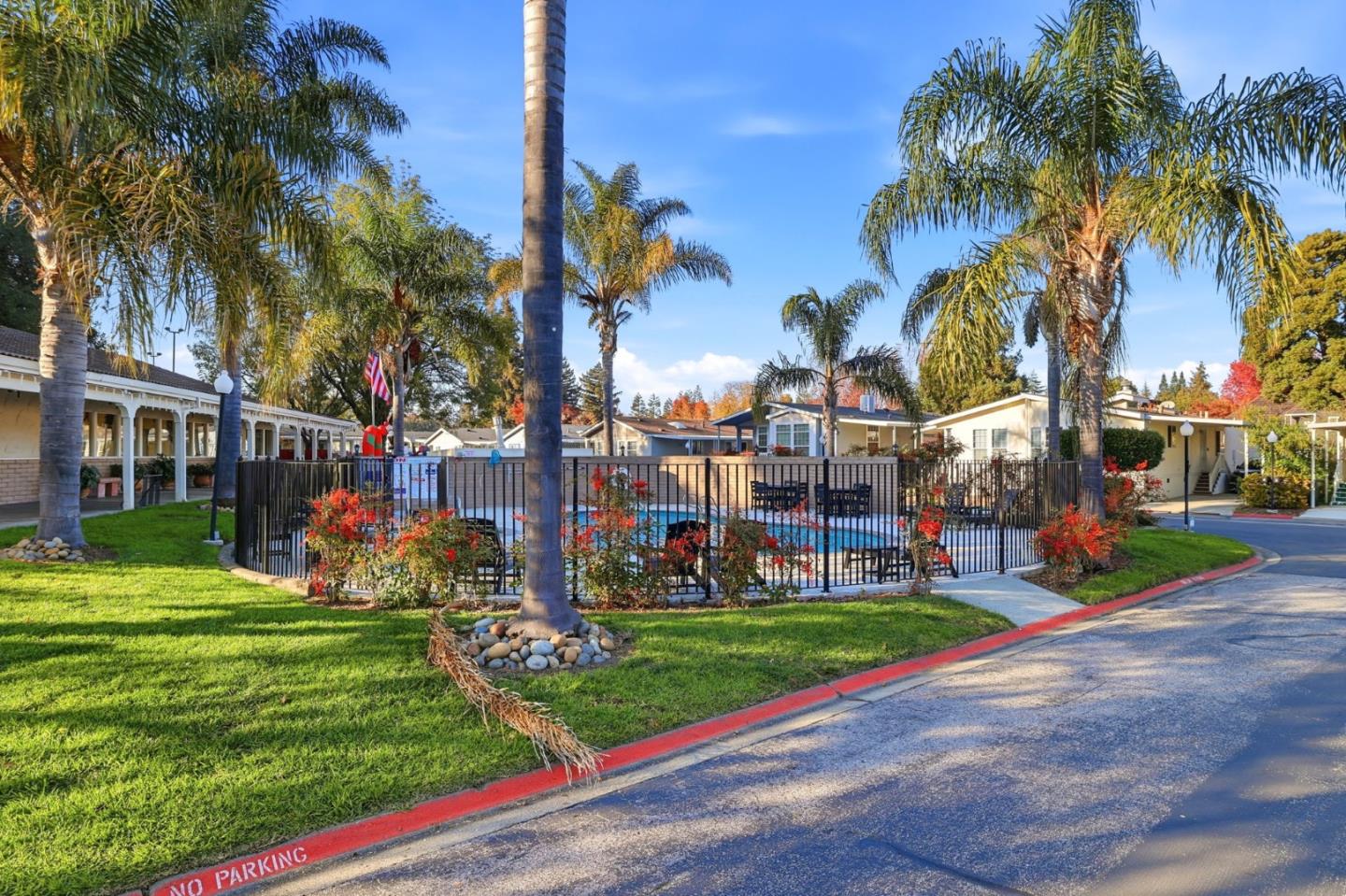125 North Mary Avenue, Unit 17 Sunnyvale, CA 94086 - Photo 46 of 46 a front view of a building with garden and trees