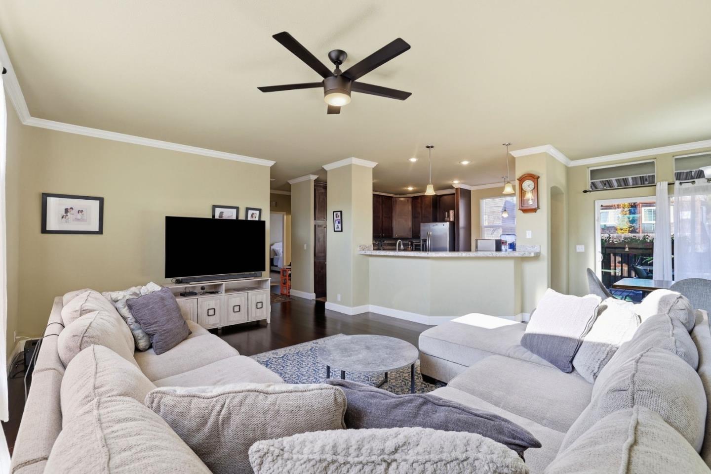 125 North Mary Avenue, Unit 17 Sunnyvale, CA 94086 - Photo 8 of 46 a living room with furniture and a flat screen tv