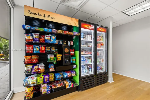 a bed room with furniture and a flat screen tv