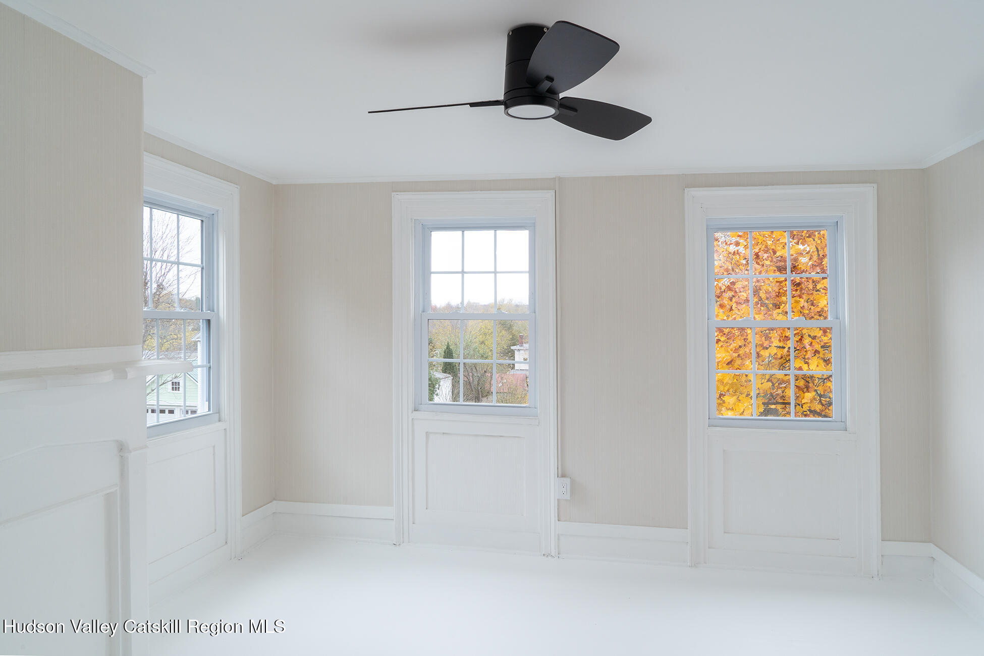 128 Broad Street Catskill, NY 12414 - Photo 12 of 15 wooden floor in an empty room with a window