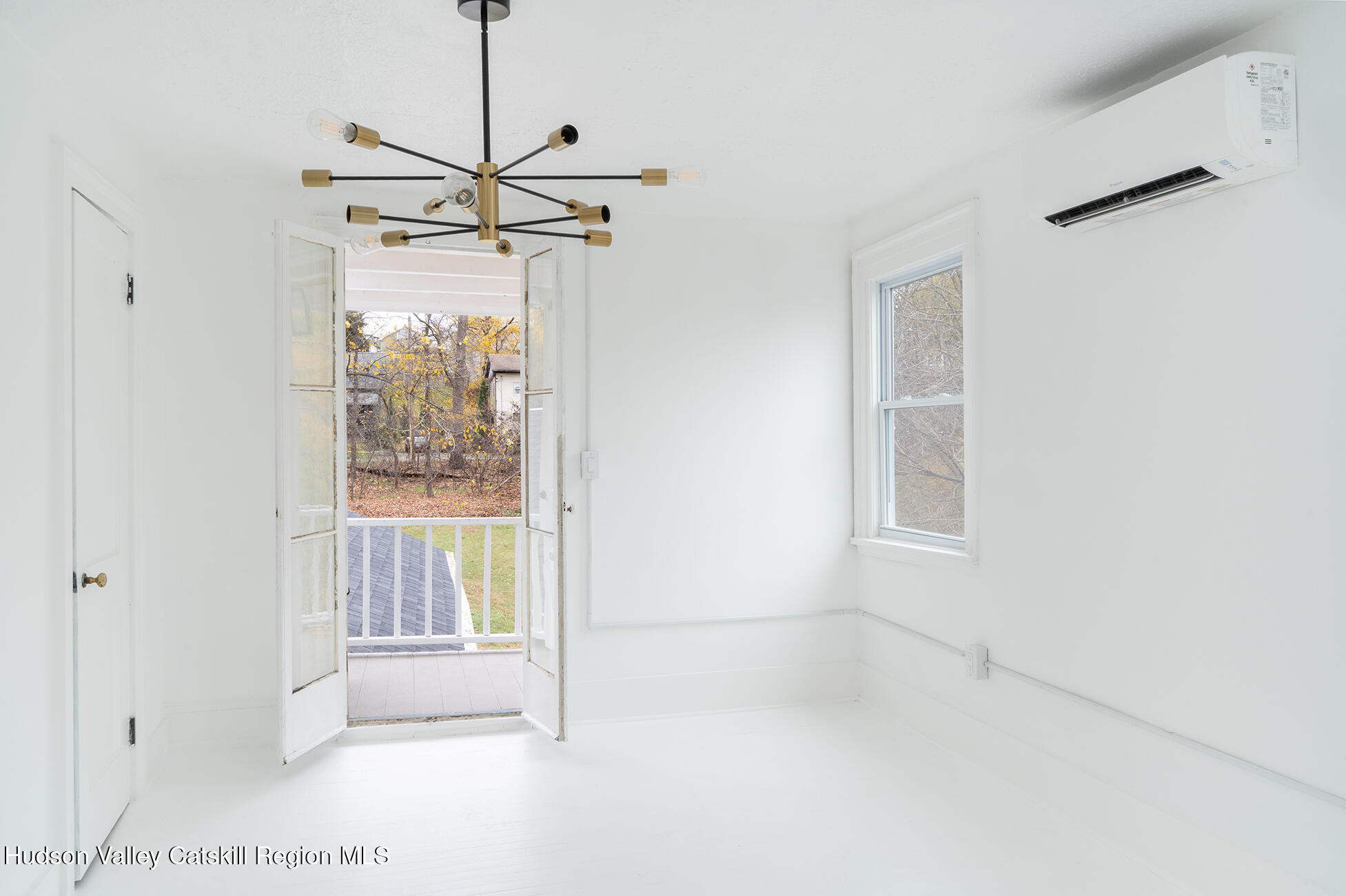 128 Broad Street Catskill, NY 12414 - Photo 13 of 15 a view of empty room with windows