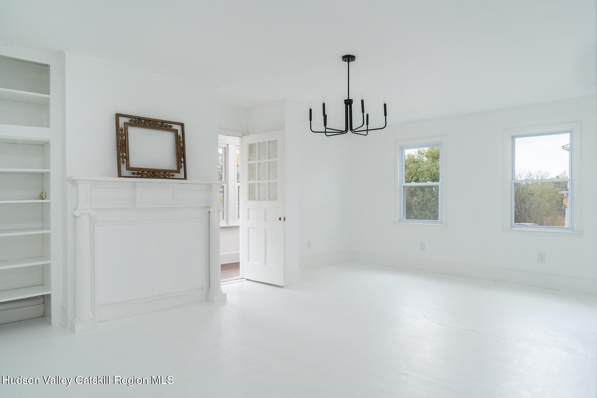 128 Broad Street Catskill, NY 12414 - Photo 3 of 15 a view of an empty room with a window