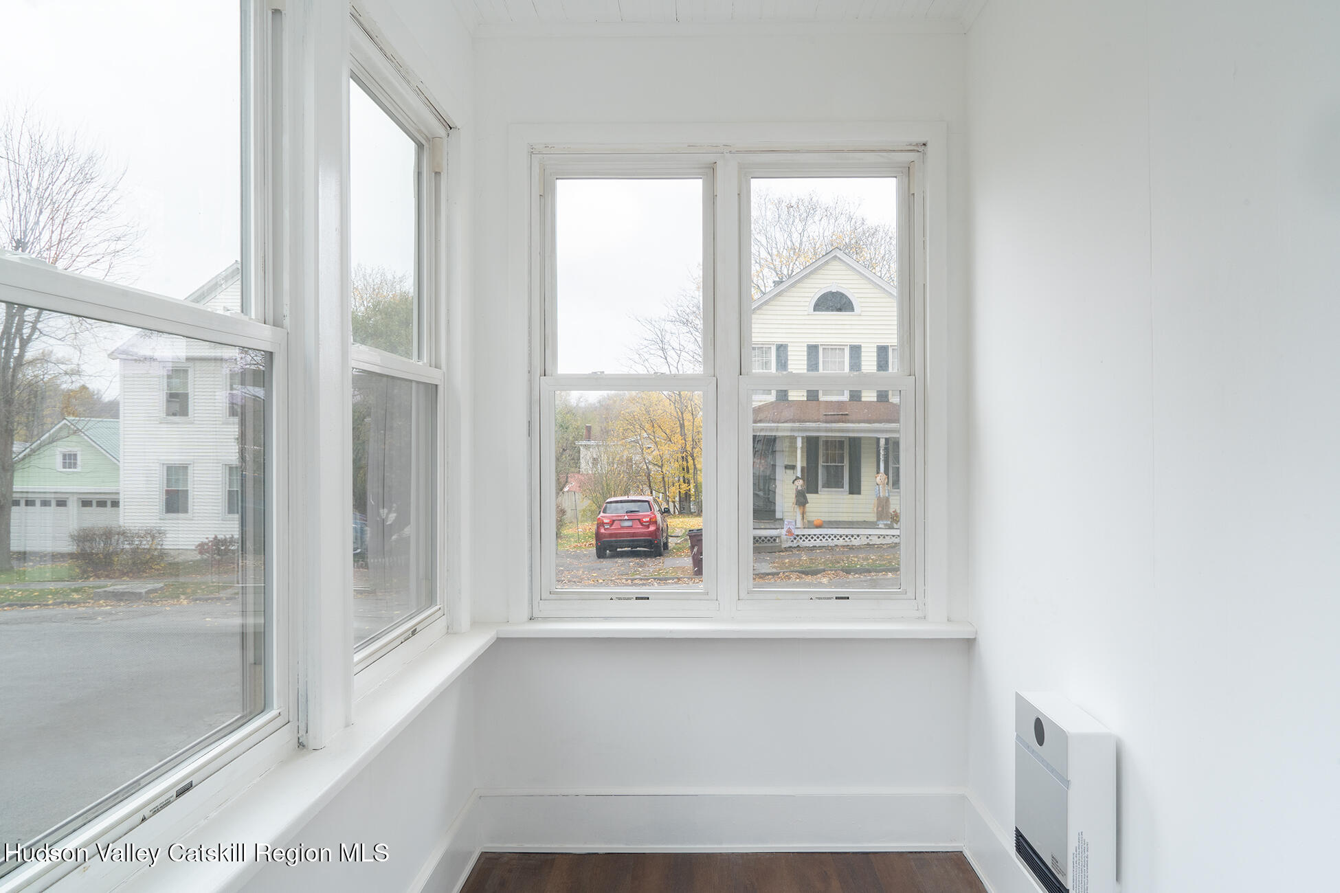 128 Broad Street Catskill, NY 12414 - Photo 4 of 15 a living room with furniture and a window