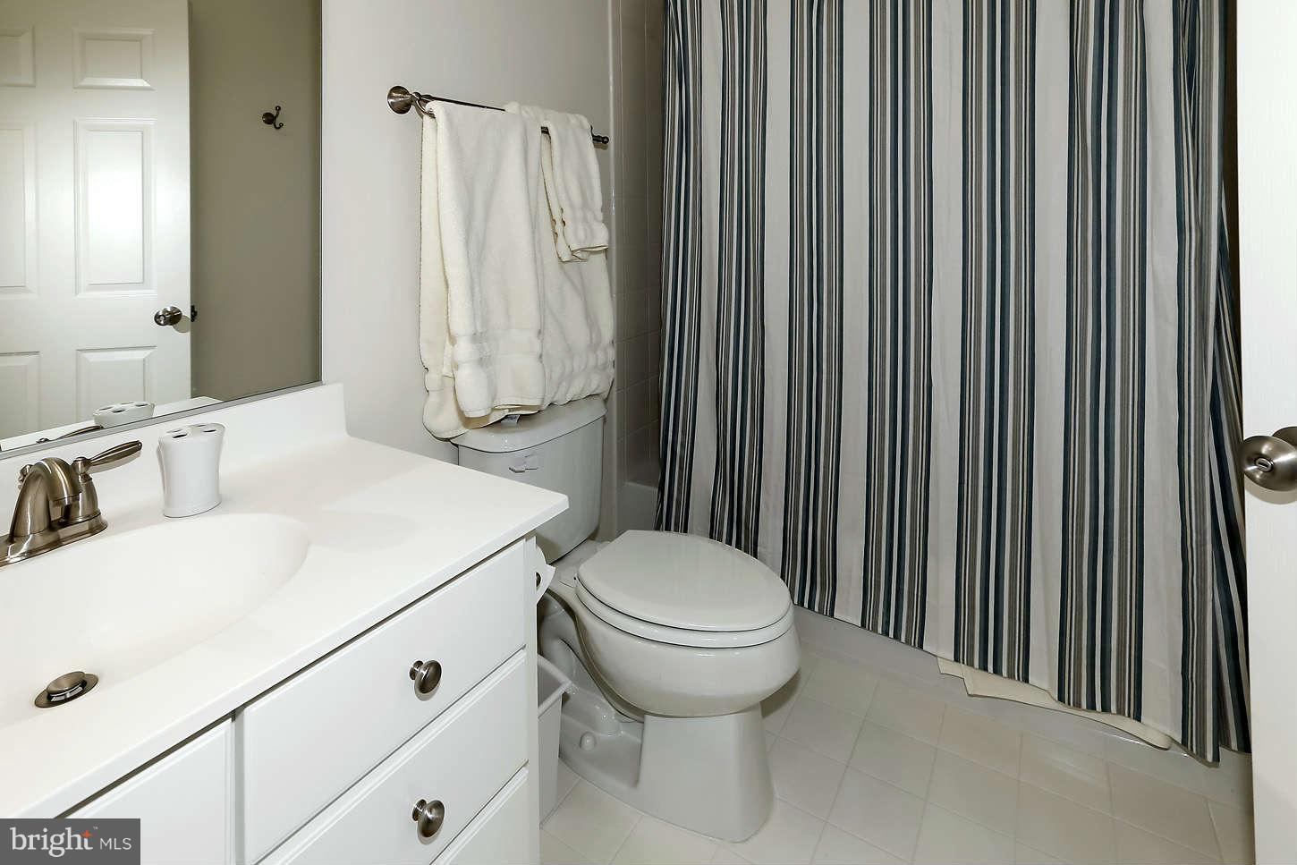 908 West Glebe Road Alexandria, VA 22305 - Photo 24 of 29 a bathroom with a sink a toilet and shower