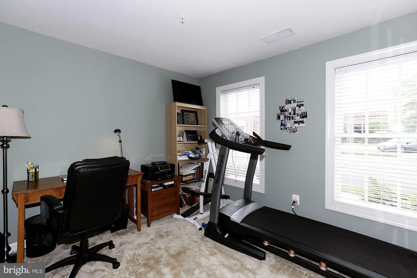 908 West Glebe Road Alexandria, VA 22305 - Photo 4 of 29 a room with furniture and a window