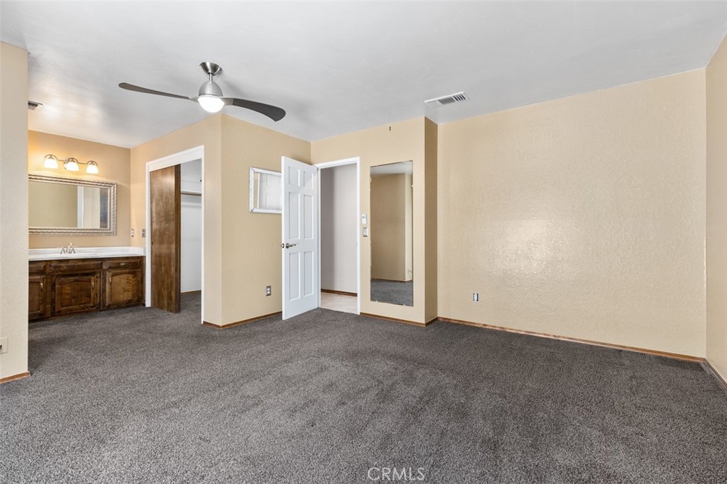 8070 Coromar Avenue Atascadero, CA 93422 - Photo 24 of 49 a view of empty room with a sink and a kitchen