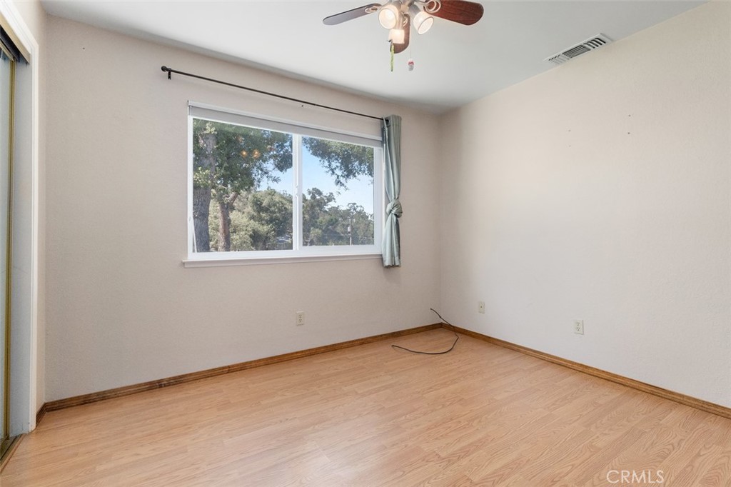 8070 Coromar Avenue Atascadero, CA 93422 - Photo 28 of 49 an empty room with a window