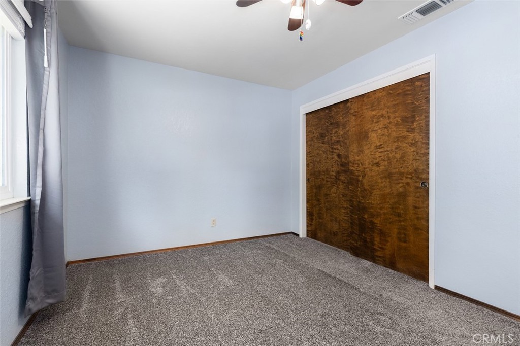 8070 Coromar Avenue Atascadero, CA 93422 - Photo 31 of 49 an empty room with a empty space and a window