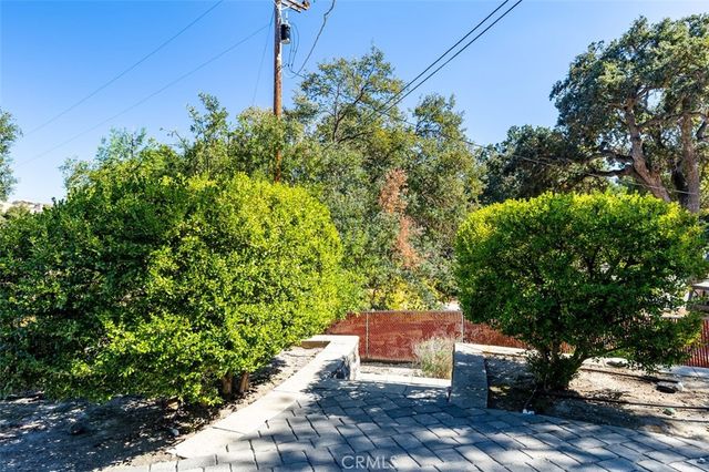 a view of outdoor sitting area with fire pit