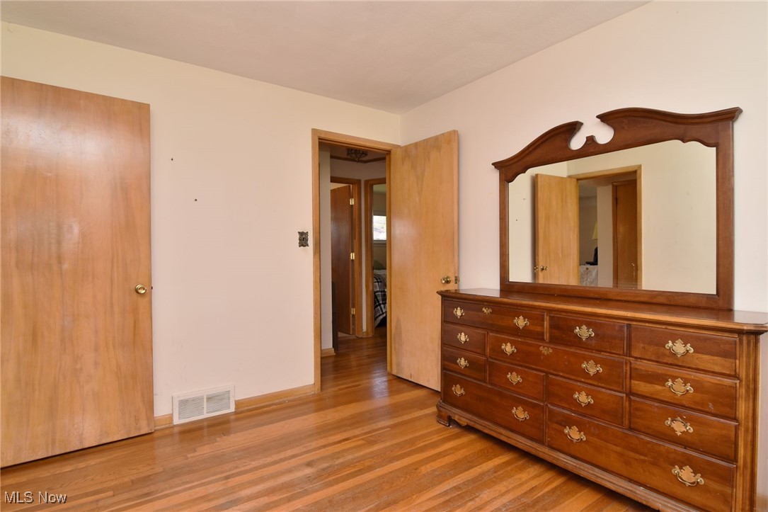 38535 Aurora Road Solon, OH 44139 - Photo 18 of 26 Unfurnished bedroom with light hardwood / wood-style flooring