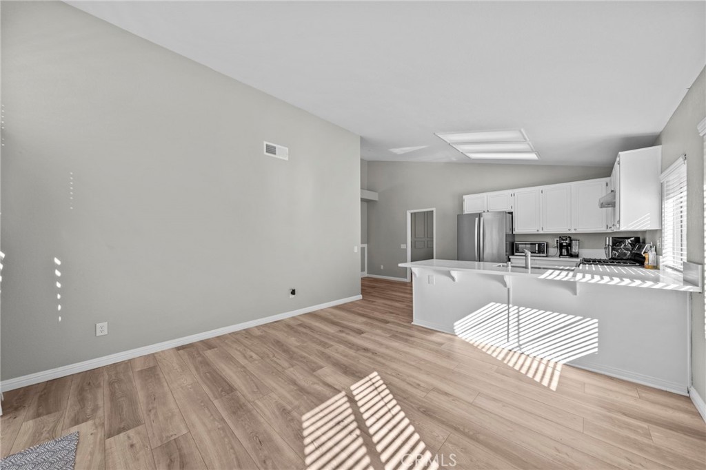 24529 Ridgewood Road Murrieta, CA 92562 - Photo 18 of 43 a view of kitchen with granite countertop cabinets and counter space