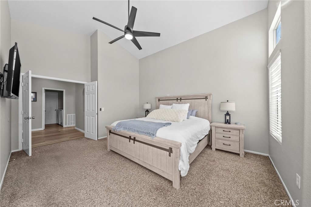 24529 Ridgewood Road Murrieta, CA 92562 - Photo 27 of 43 a bedroom with a bed and a cabinets