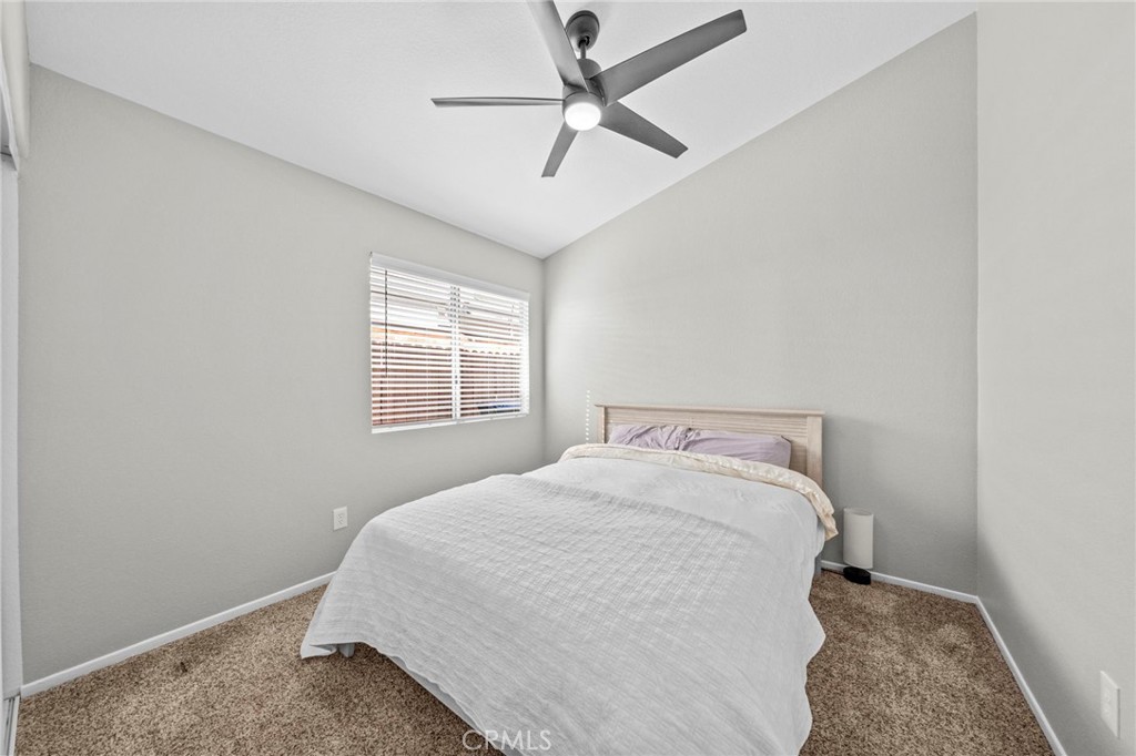 24529 Ridgewood Road Murrieta, CA 92562 - Photo 29 of 43 a bedroom with a bed and a window