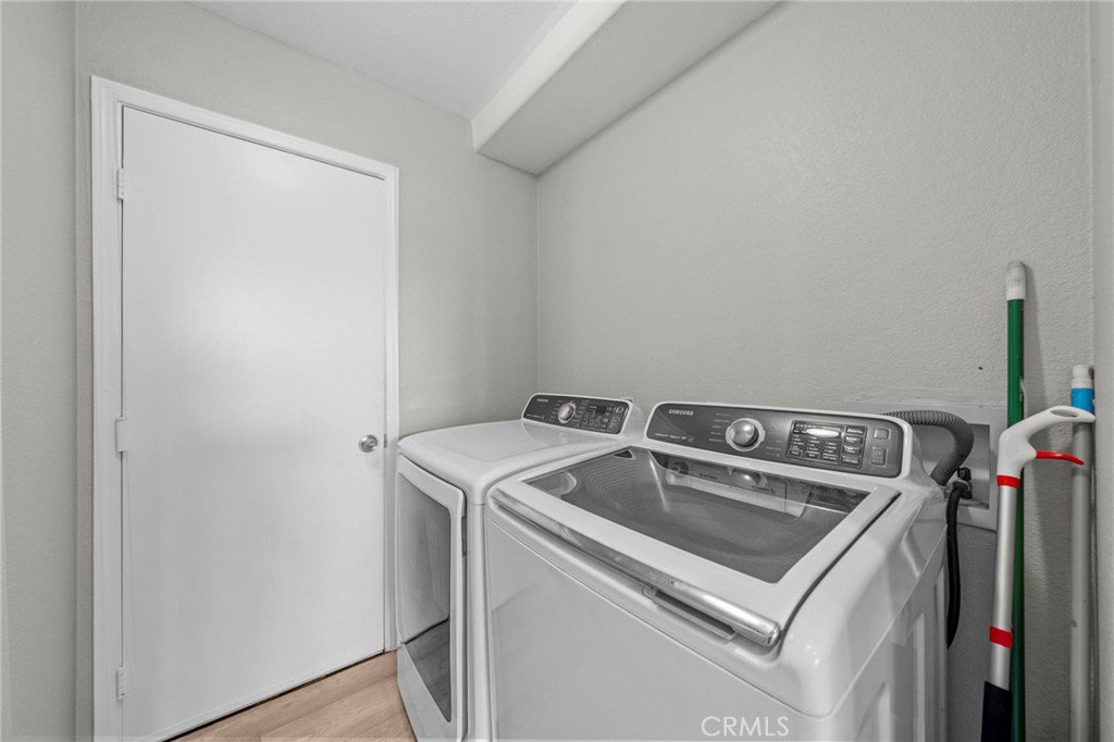 24529 Ridgewood Road Murrieta, CA 92562 - Photo 32 of 43 a utility room with dryer and washer