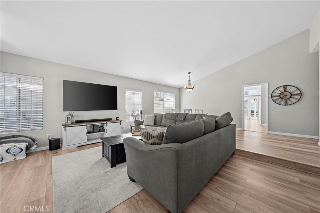 24529 Ridgewood Road Murrieta, CA 92562 - Photo 9 of 43 a living room with furniture and a flat screen tv