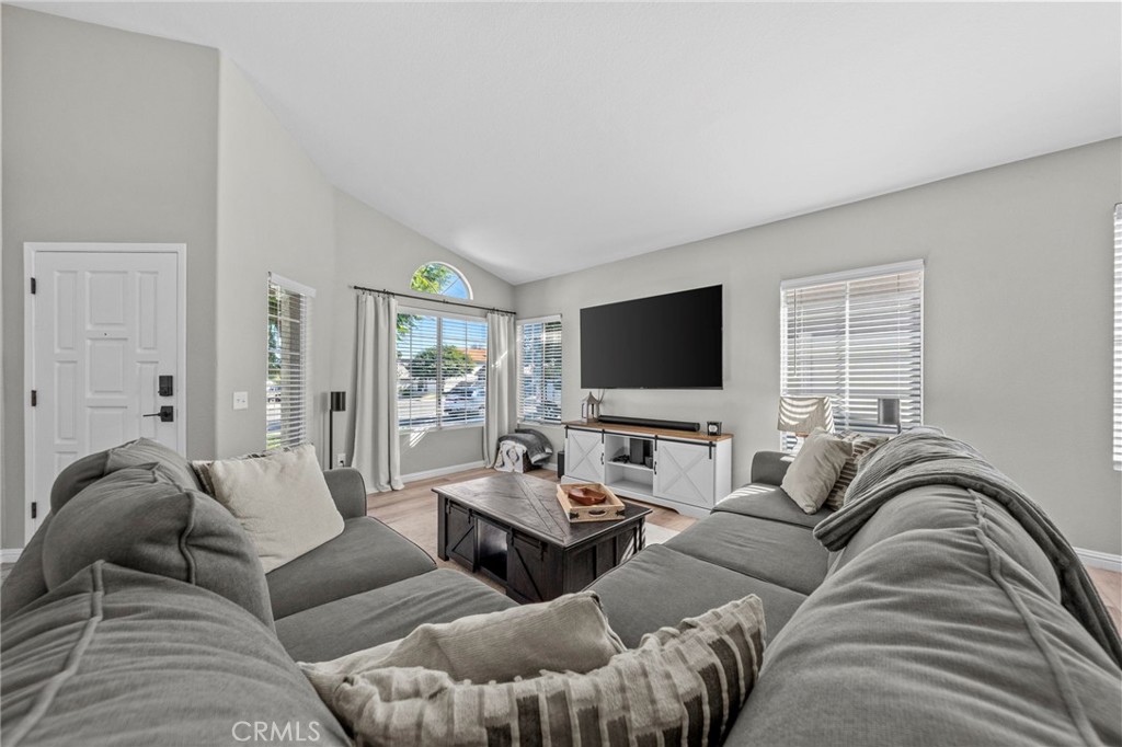 24529 Ridgewood Road Murrieta, CA 92562 - Photo 10 of 43 a living room with furniture and a flat screen tv