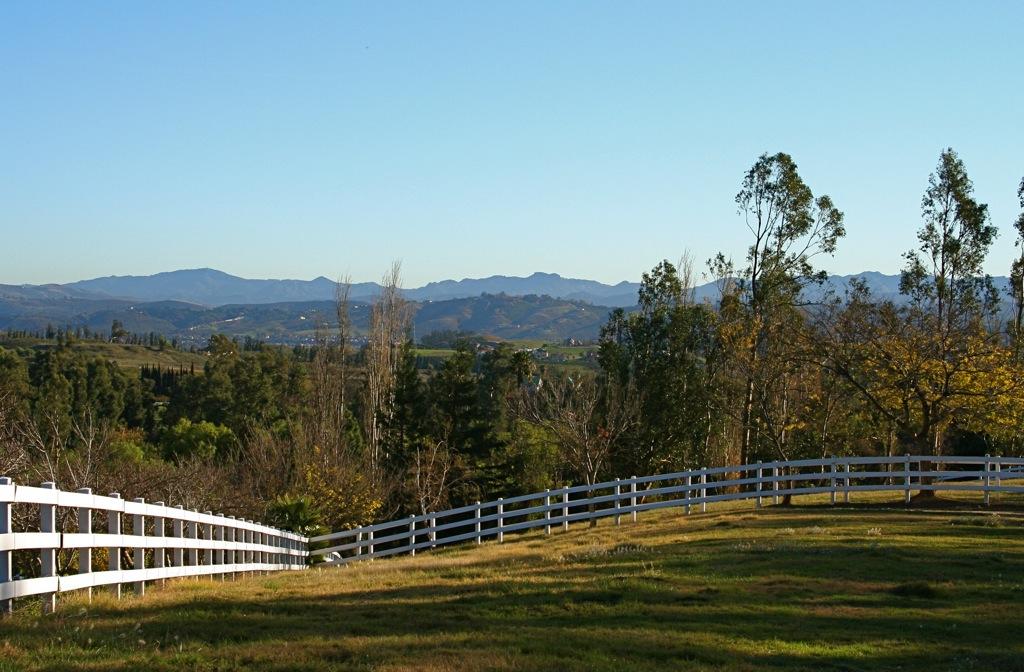 10700 Broadway Road Moorpark, CA 93021 - Photo 1 of 18 a view of a swimming pool with a yard and mountain view