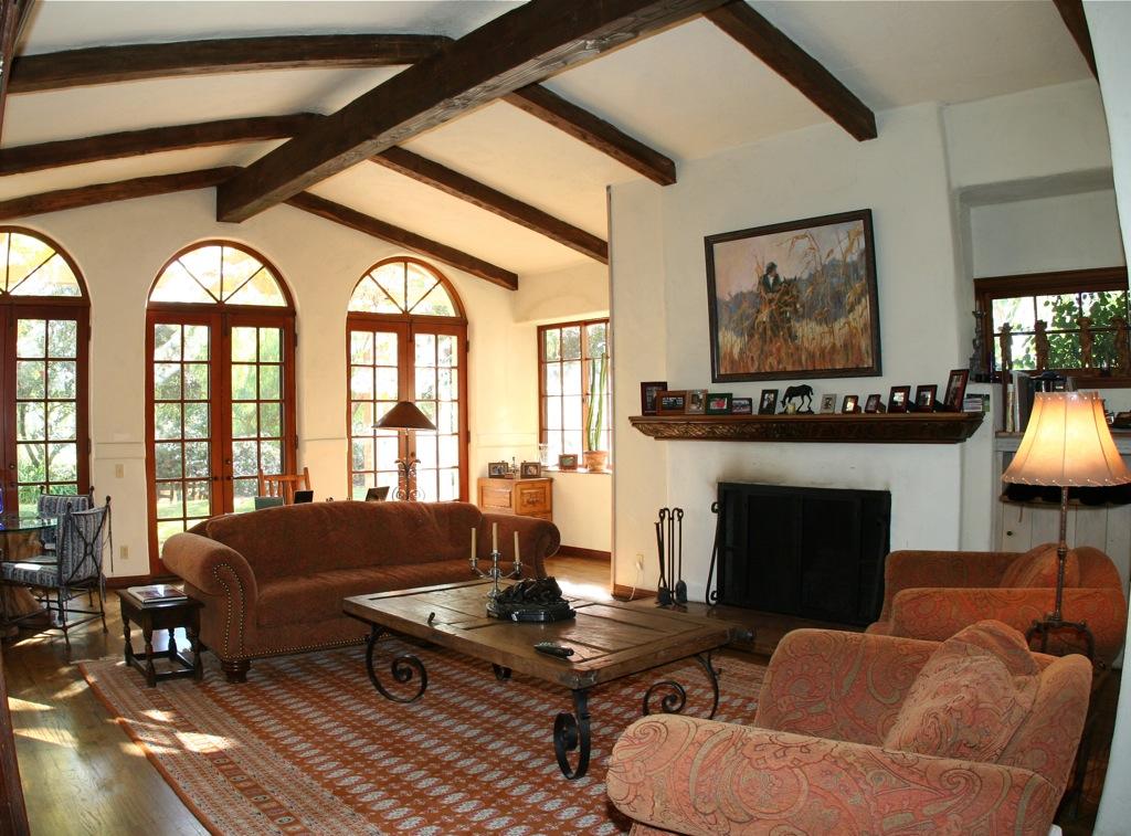 10700 Broadway Road Moorpark, CA 93021 - Photo 5 of 18 a living room with furniture a fireplace and a large window