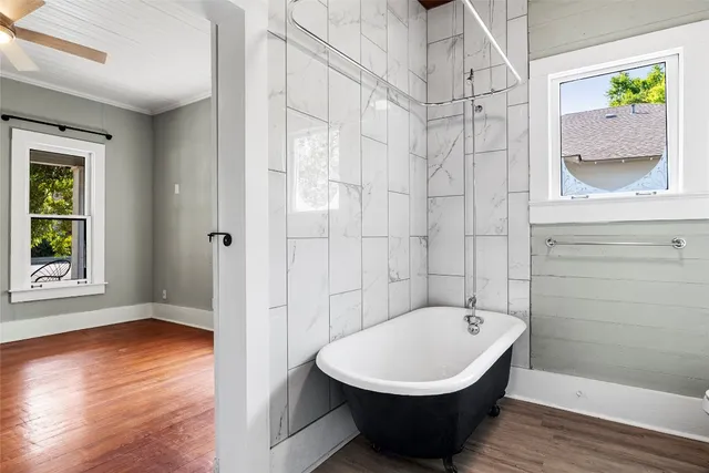 a bathroom with a sink and shower