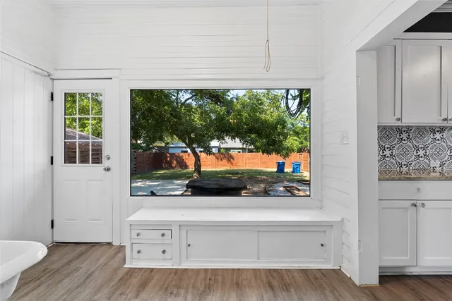 a view of front door and bedroom