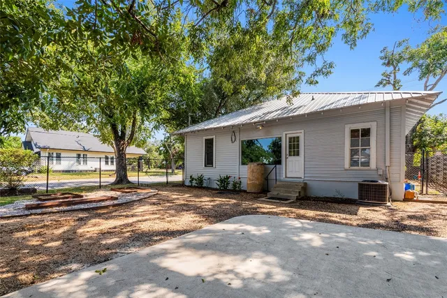 a view of a house with a patio