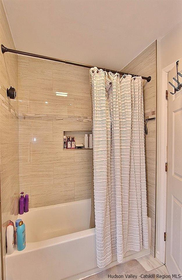 150 Nelson Hoff Road Saugerties, NY 12477 - Photo 19 of 31 a bathroom with a shower and a bath tub