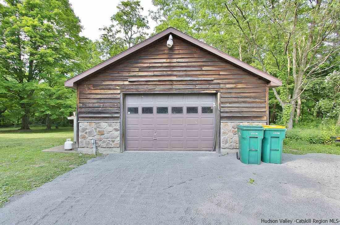 150 Nelson Hoff Road Saugerties, NY 12477 - Photo 27 of 31 a view of a house with yard and garage