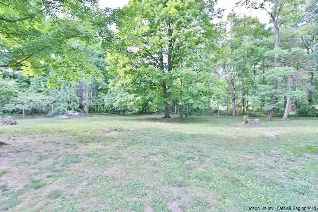 150 Nelson Hoff Road Saugerties, NY 12477 - Photo 28 of 31 a view of outdoor space with deck and yard