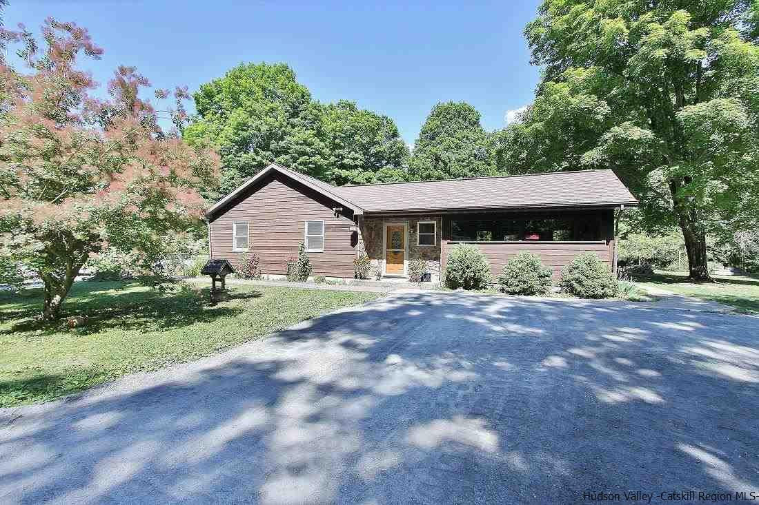 150 Nelson Hoff Road Saugerties, NY 12477 - Photo 31 of 31 a view of a house with a yard and large tree