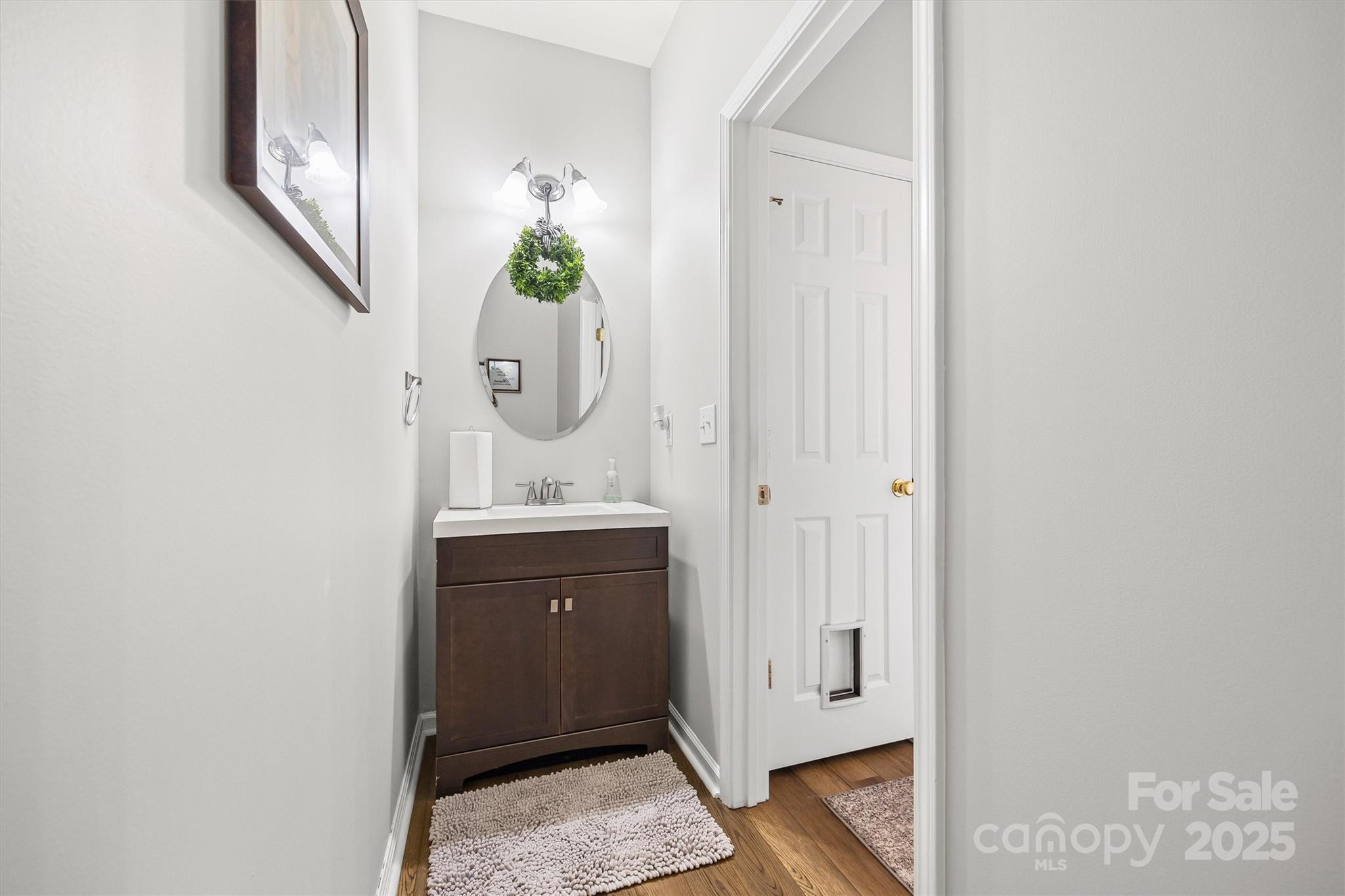 316 Tinder Box Lane Fort Mill, SC 29708 - Photo 12 of 28 a bathroom with a granite countertop sink a mirror and a
