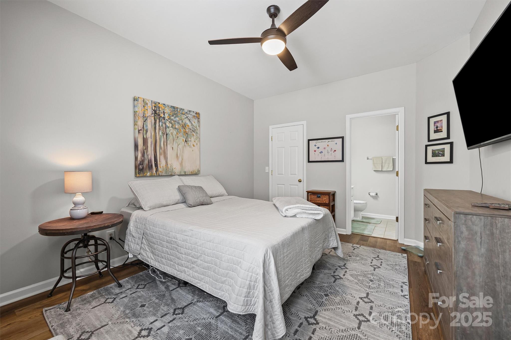 316 Tinder Box Lane Fort Mill, SC 29708 - Photo 13 of 28 a bedroom with a bed and a flat screen tv
