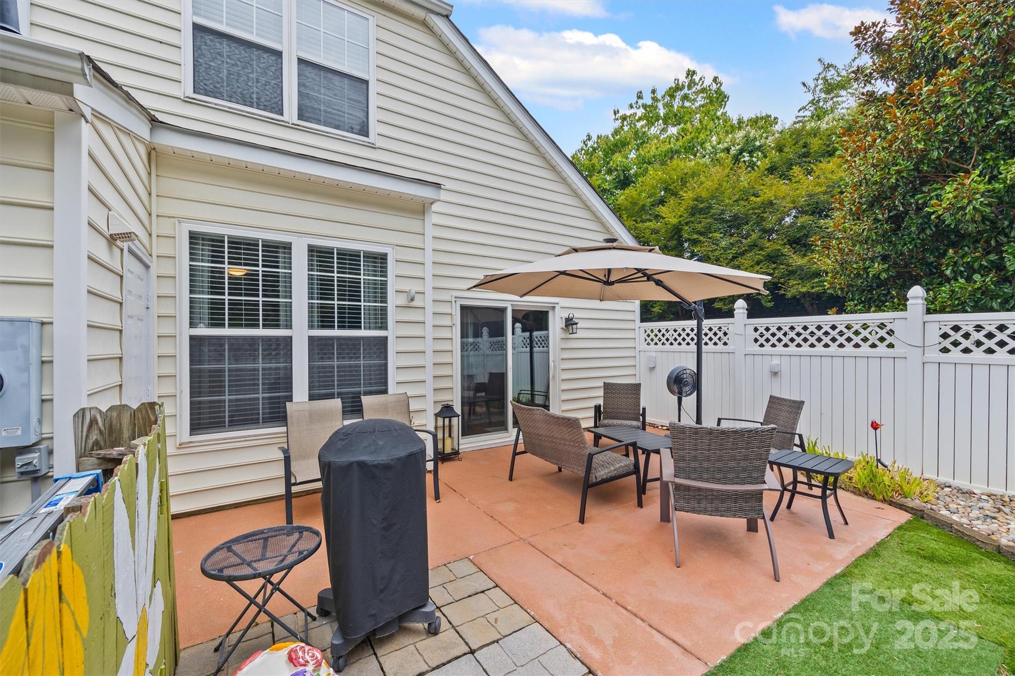 316 Tinder Box Lane Fort Mill, SC 29708 - Photo 26 of 28 a view of a dinning tables and chairs in the patio
