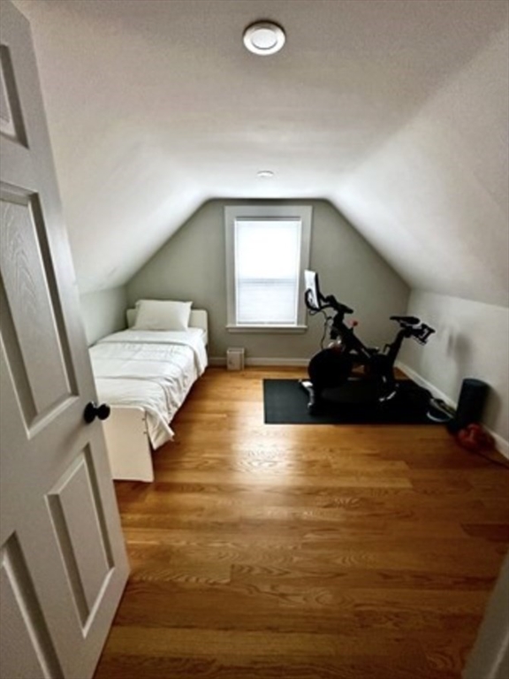 14 Everett Street, Unit 2 Medford, MA 02155 - Photo 16 of 24 a living room with furniture and a large window