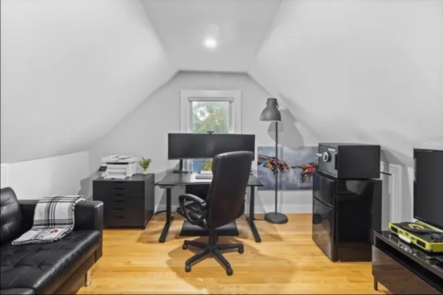 a view of a workspace with furniture