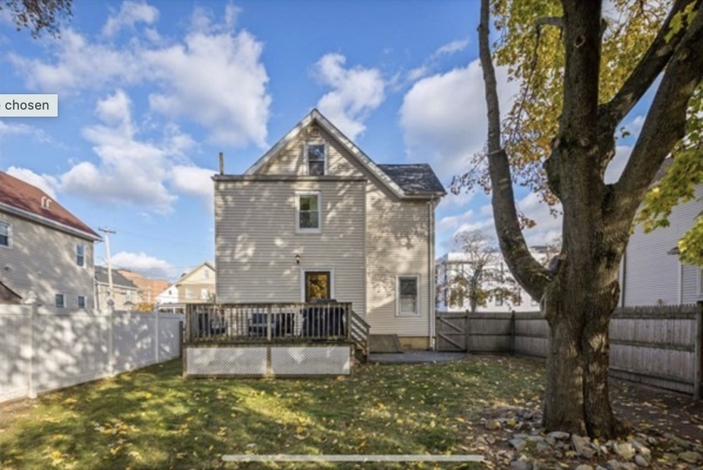 14 Everett Street, Unit 2 Medford, MA 02155 - Photo 23 of 24 a view of a house with a yard