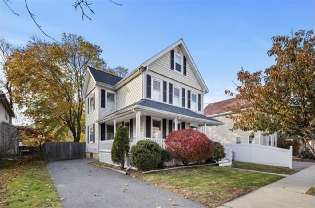 14 Everett Street, Unit 2 Medford, MA 02155 - Photo 3 of 24 front view of a house with a garden