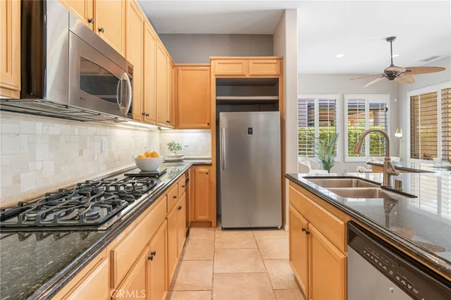a bathroom with a sink a mirror and a toilet