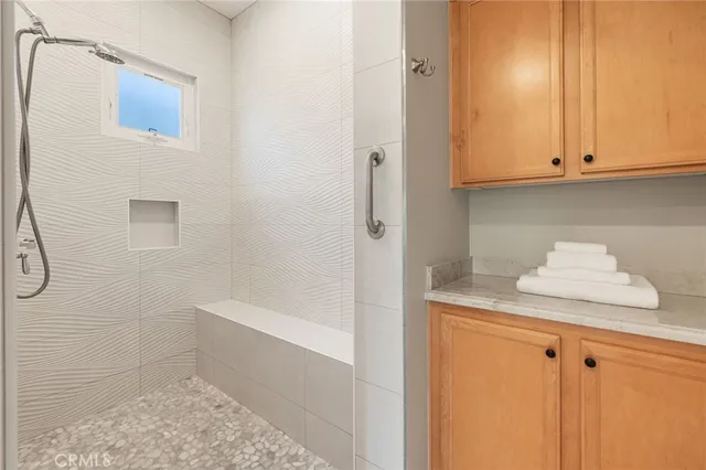 a bedroom with bed and window