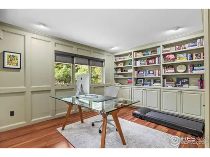 a room with furniture and a book shelf