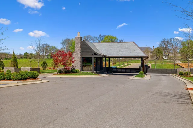 a view of a house with basketball court