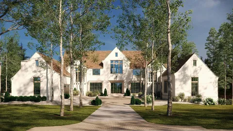 a view of a white house with a yard