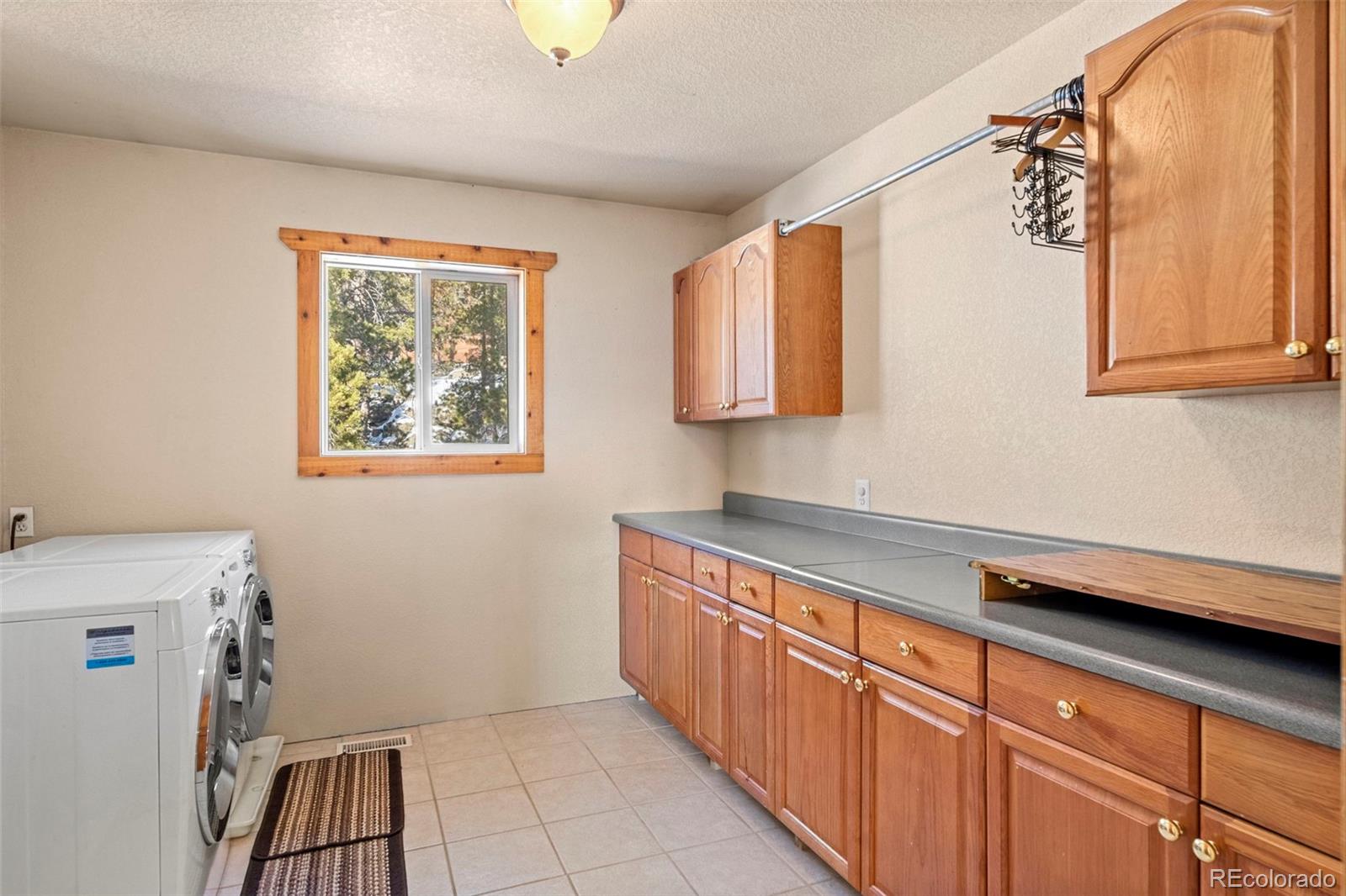 412 Evergreen Road Black Hawk, CO 80422 - Photo 39 of 48 a kitchen with stainless steel appliances granite countertop a sink and a cabinets