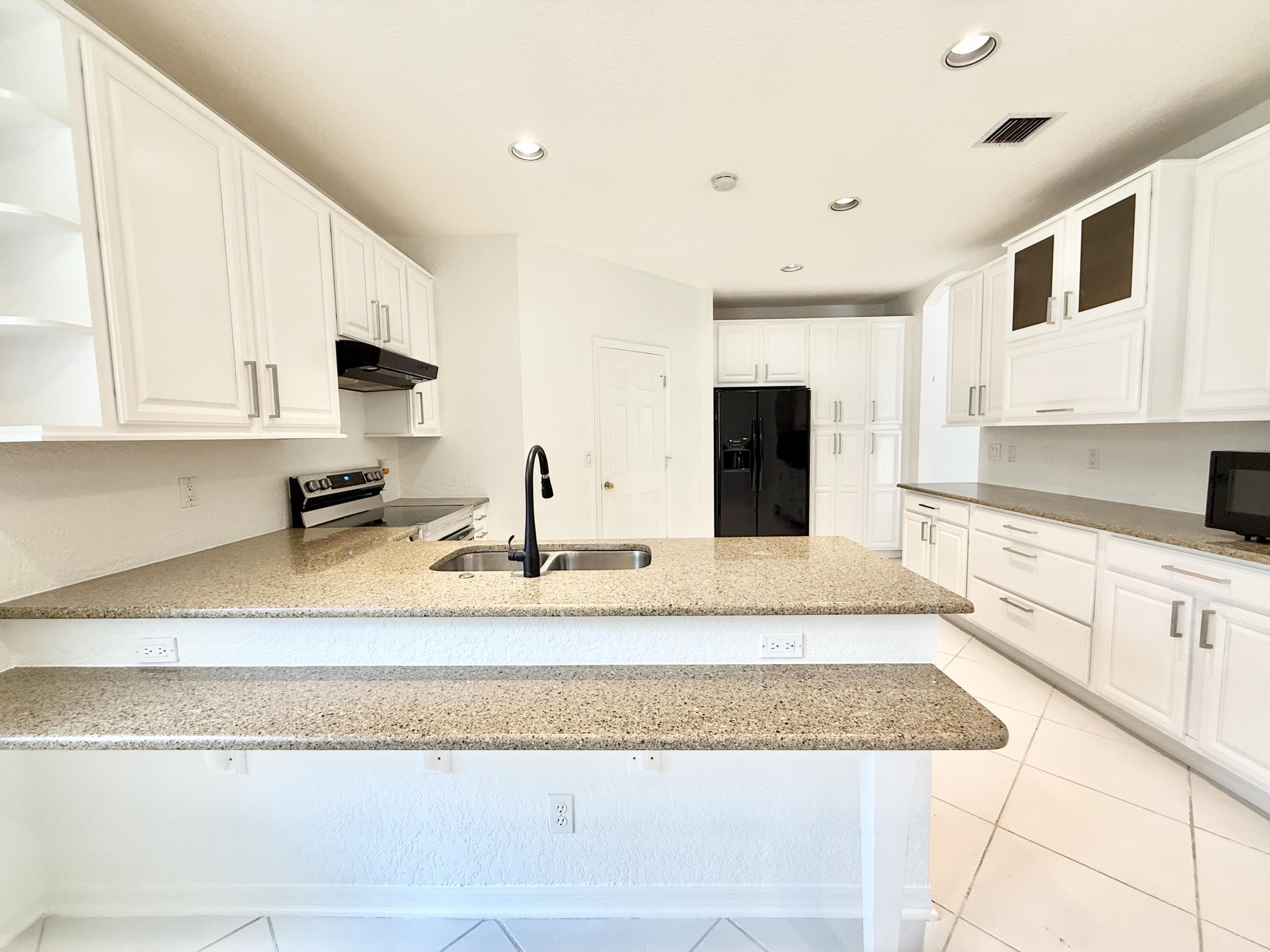 12310 Riverfalls Court Boca Raton, FL 33428 - Photo 13 of 30 Granite Kitchen