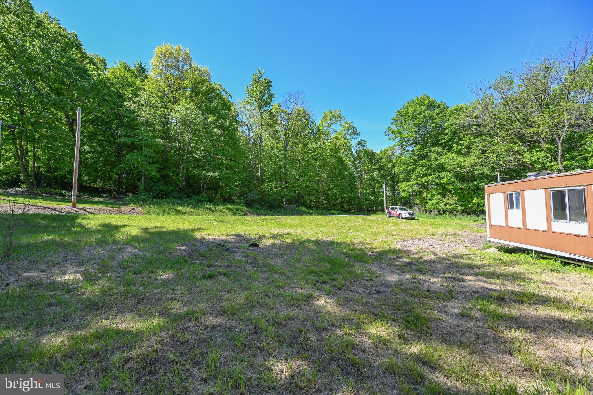1011 Teets Road Friendsville, MD 21531 - Photo 4 of 19 a view of a house with a backyard