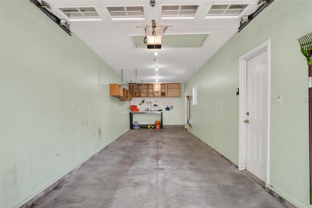 34 Erion Crescent Rochester, NY 14607 - Photo 49 of 49 2 car tandem garage with poured cement floor